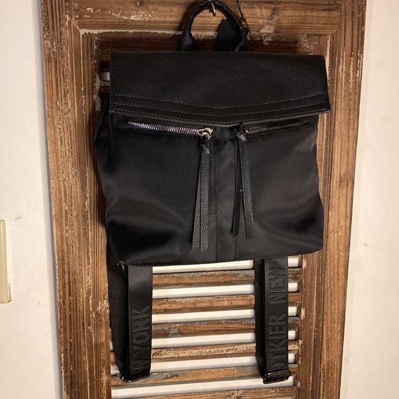 NWT Botkier mini trigger NYLON BACKPACK BLACK WITH GUITAR LIKE LOGO STRAPS